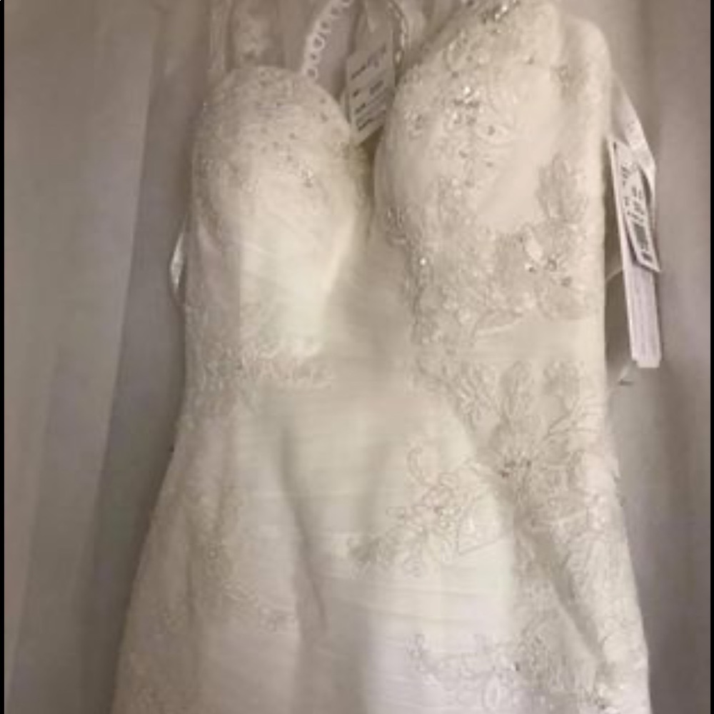 Brand new with tags wedding gown